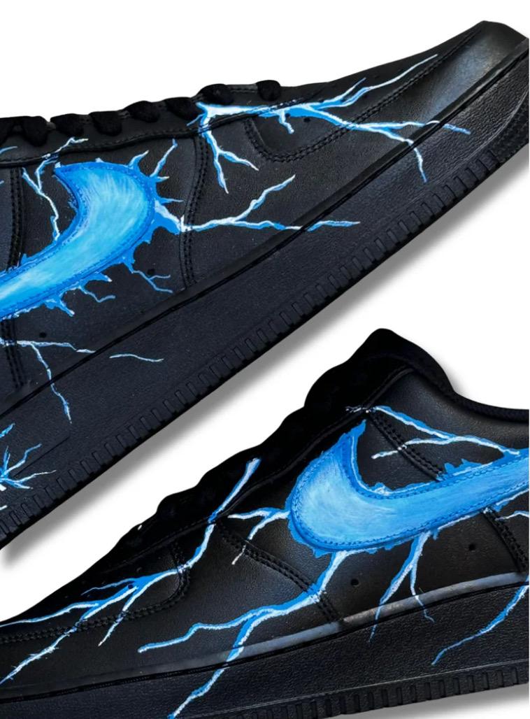 Black Air Force 1 sneakers with custom blue lightning bolts, handmade