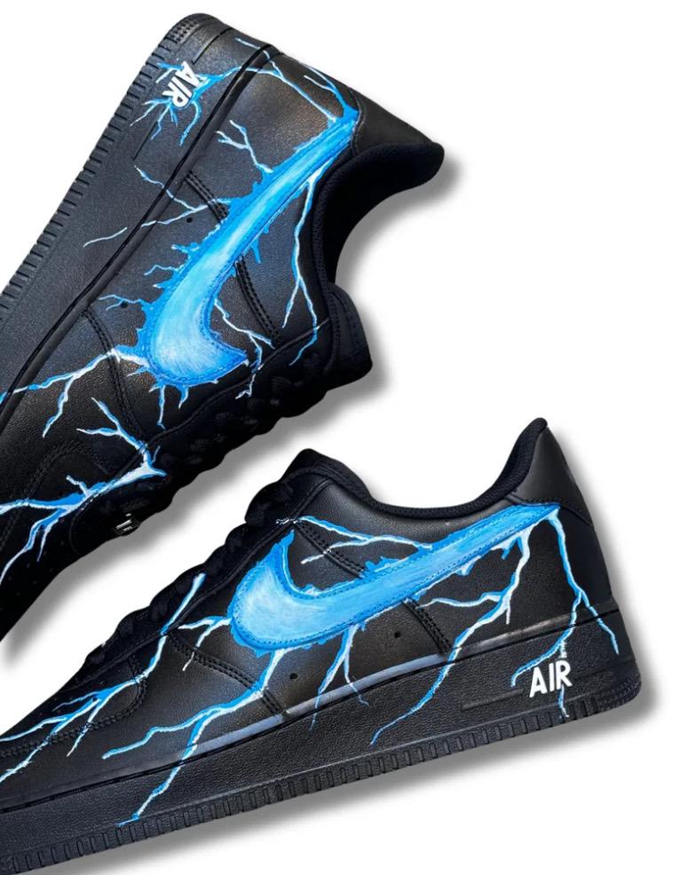 Black Air Force 1 sneakers with custom blue lightning bolts, handmade