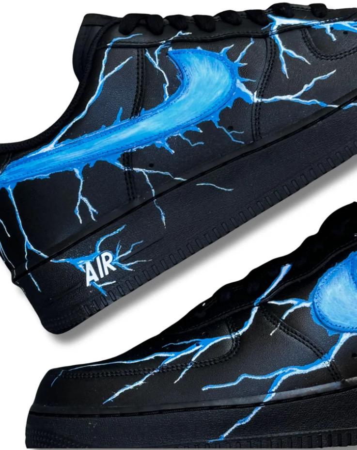 Black Air Force 1 sneakers with custom blue lightning bolts, handmade